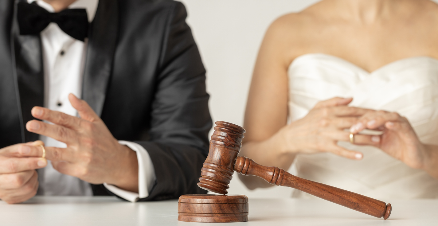 Bride, groom and gavel.